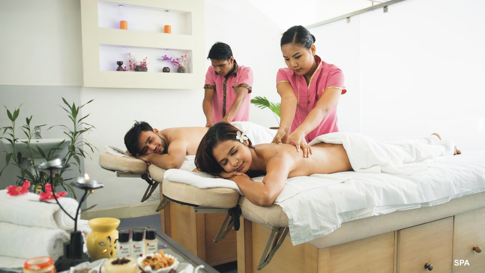 A couple getting a couple spa at the in-house spa at Hotel Clarks Shiraz - A Five-Star Hotel in Agra.
