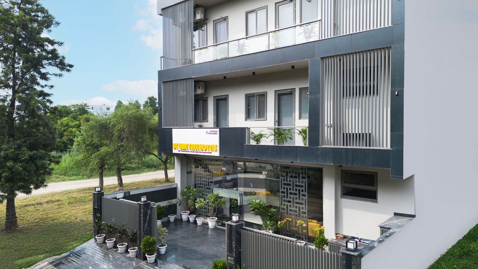 Front view of Lime Tree Hotels Ystays Greater Noida building