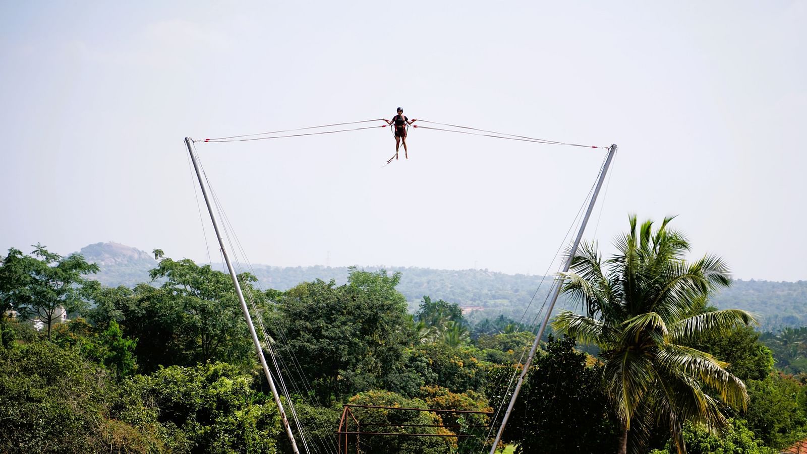Image of a person enjoying high in the air on Rocket Line Ejector at Ravishing Retreat