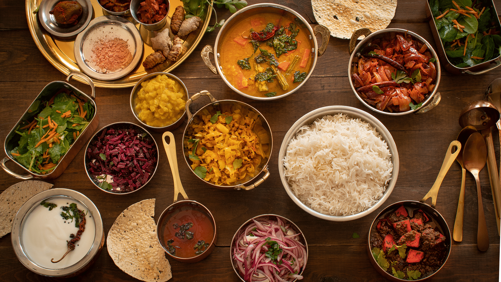 a view from above of Assortment of several food items - Rhythm Kumarakom