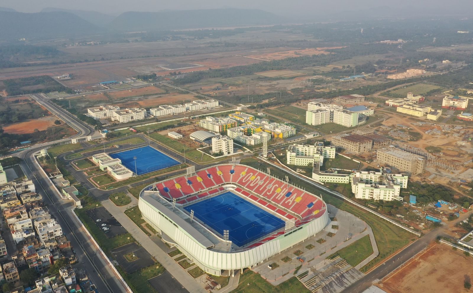 Aerial view of the stadium and Facade of Mayfair World Cup Village, Rourkela 11