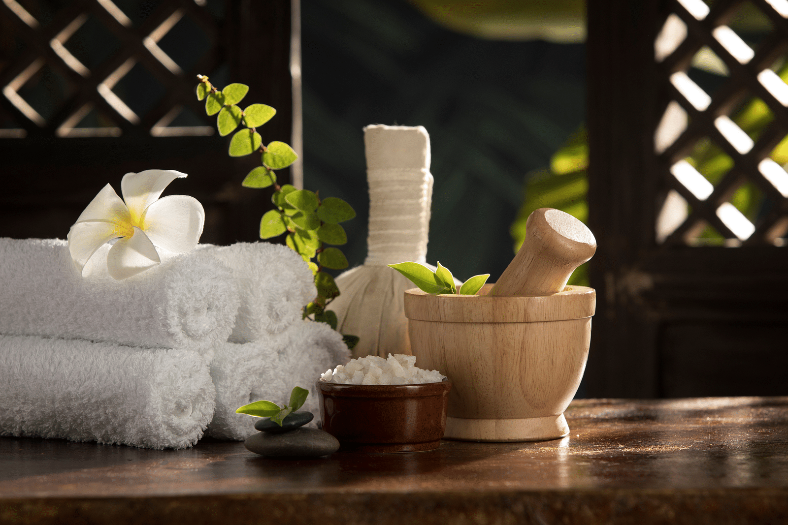 spa items including towels, salts and more in view - Rhythm Kumarakom