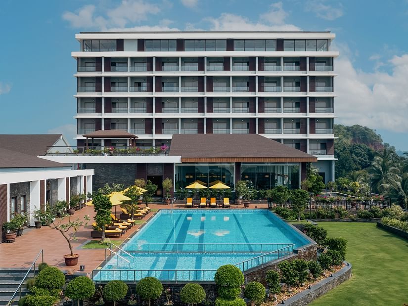facade view of Cloud9 Sarovar Premiere, Palolem Goa with a swimming pool.