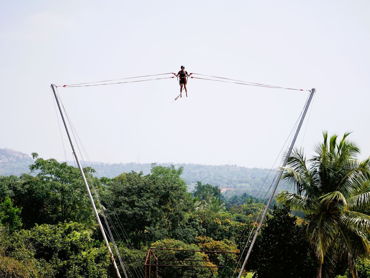 Image of a person enjoying high in the air on Rocket Line Ejector at Ravishing Retreat