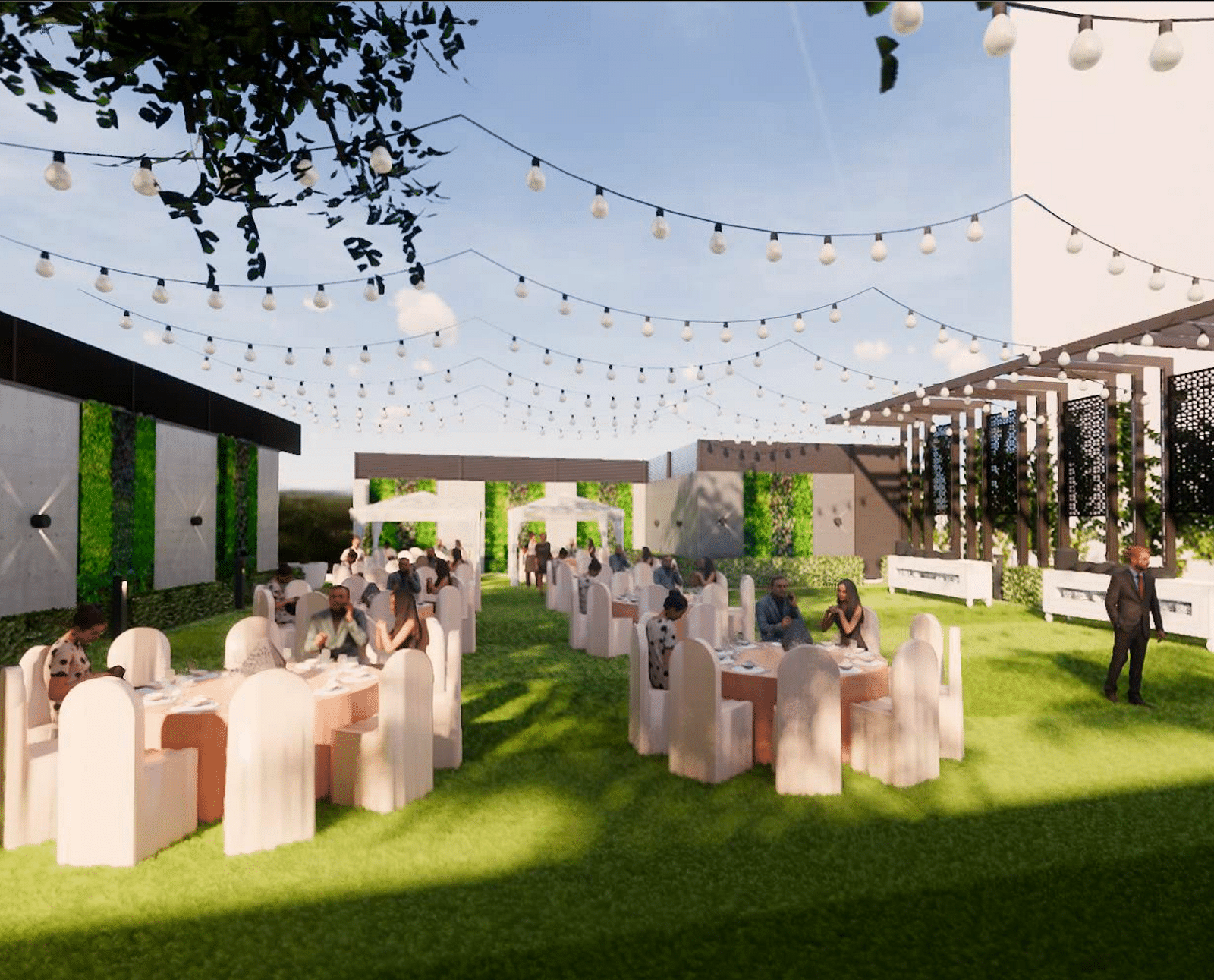 Lawn space with tables and chairs decorated and arranged for a proper setting with strings of lights above and the building of the hotel in the background ideally making it one of the best wedding  venues in Lucknow 