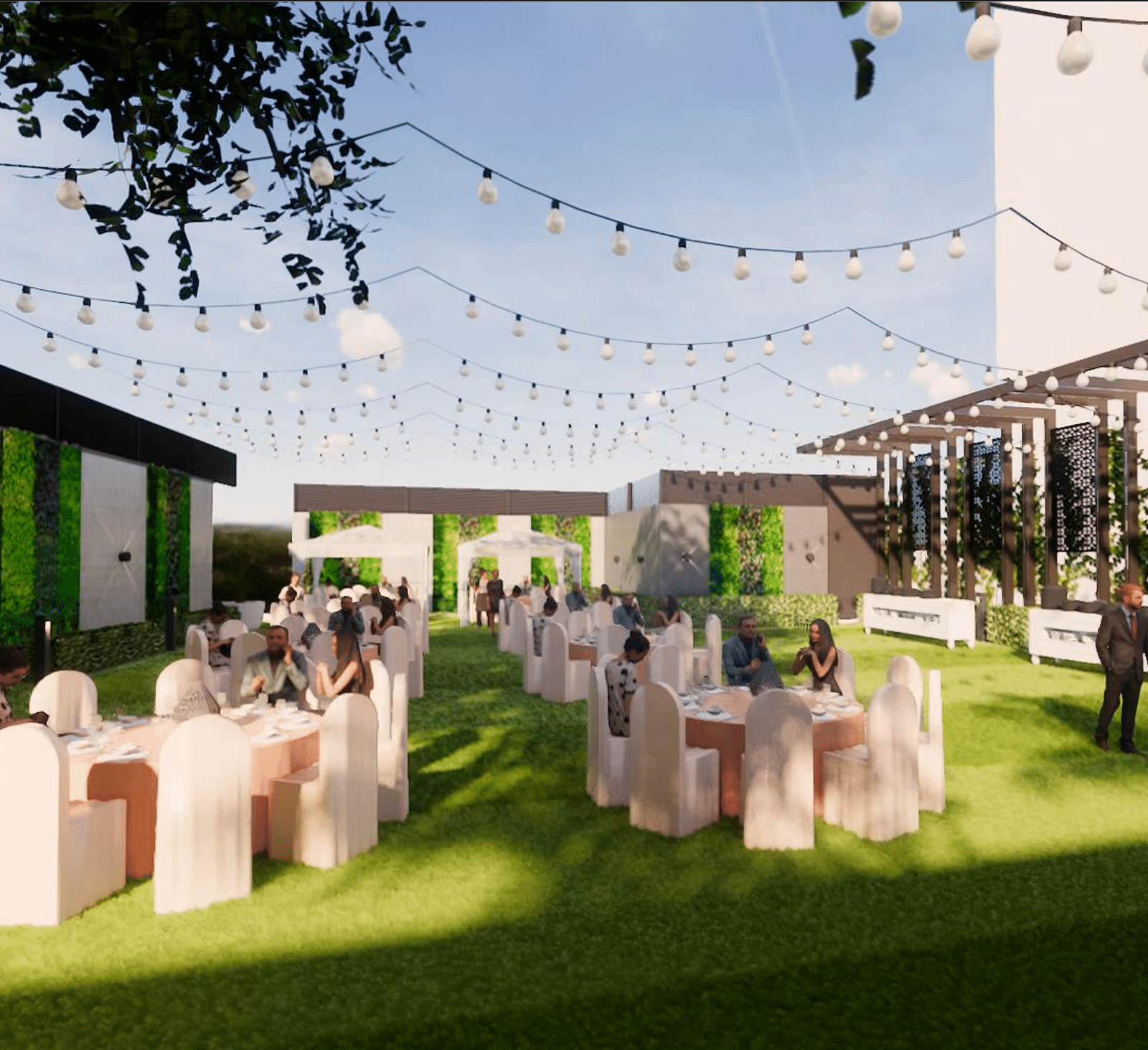 Lawn space with tables and chairs decorated and arranged for a proper setting with strings of lights above and the building of the hotel in the background ideally making it one of the best wedding  venues in Lucknow 