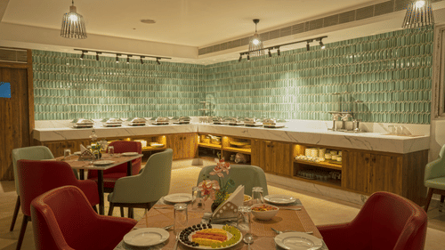 Seating arrangement in the restaurant at Grand Continent, Secunderabad