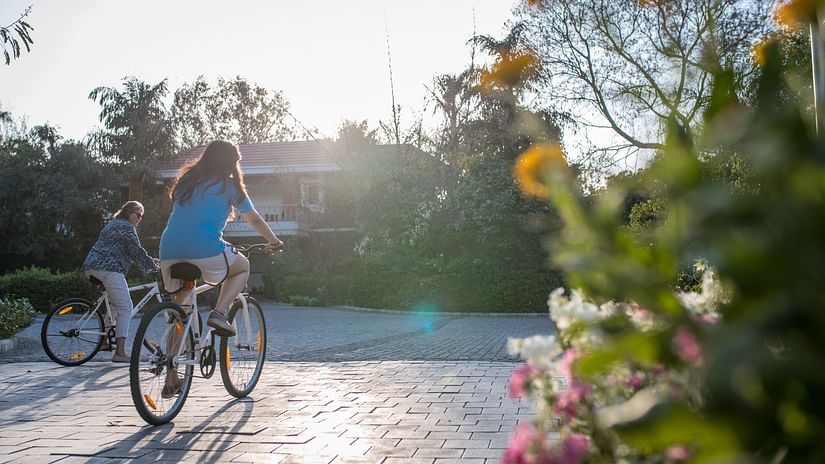 guests cycling at Karma Lakelands