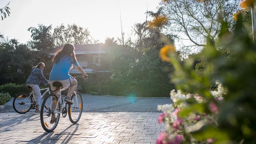 guests cycling at Karma Lakelands