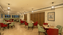 Seating arrangement in the restaurant at Grand Continent, Secunderabad