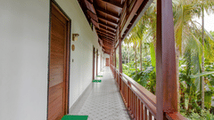 a balcony leading to the Accommodations at our resort in Neil Island - Symphony Summer Sand Beach Resort And Spa, Neil Island