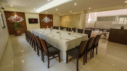 closer view of a dining table in a restaurant - Magnus Square Viman Nagar