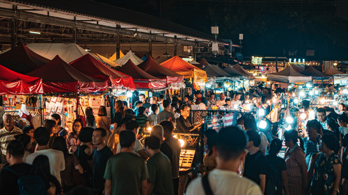 People exploring a night market