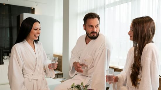 Picture featuring three people having a conversation