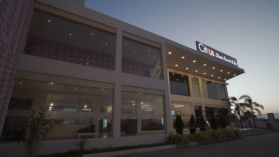 Facade of Citrus Classic Resorts and Spa Mahabalipuram ECR as the sun goes down and the lights twinkling in and around the building