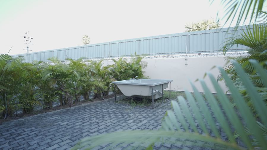 A jacuzzi outdoor at Citrus Classic Resorts and Spa Mahabalipuram ECR placed amidst planted shrubs