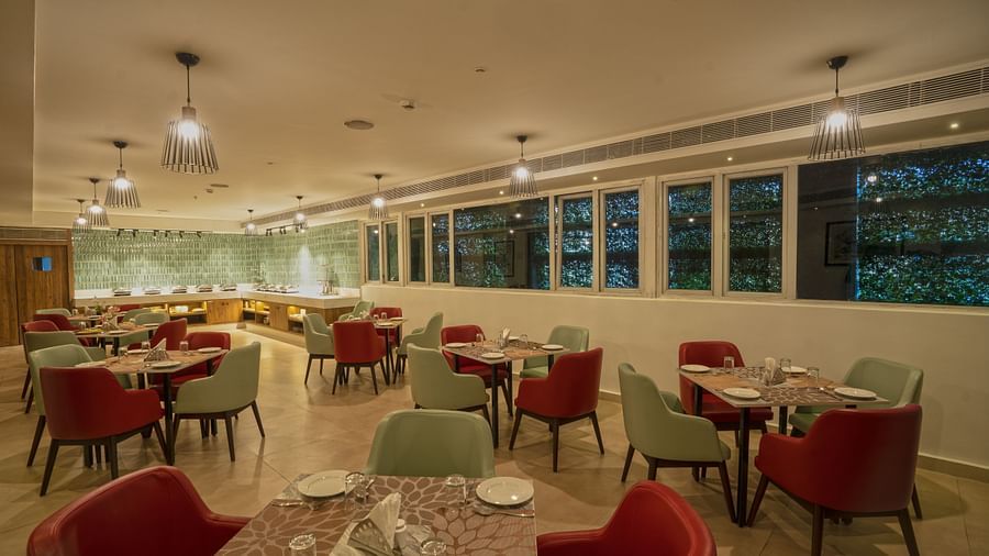 Seating arrangement in the restaurant at Grand Continent, Secunderabad