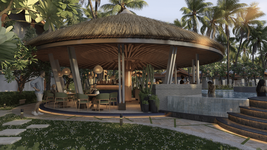 A dine-in option at Symphony Palms Beach Resort And Spa, showcasing an open-air gazebo with a thatched roof and wooden pillars, surrounded by tropical plants and a water feature or pool area.