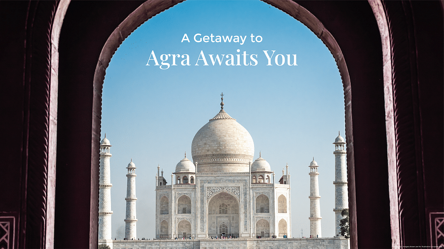 Cover Image of the facade of Taj Mahal from its entrance with a line that says - A Getaway to Agra Awaits You