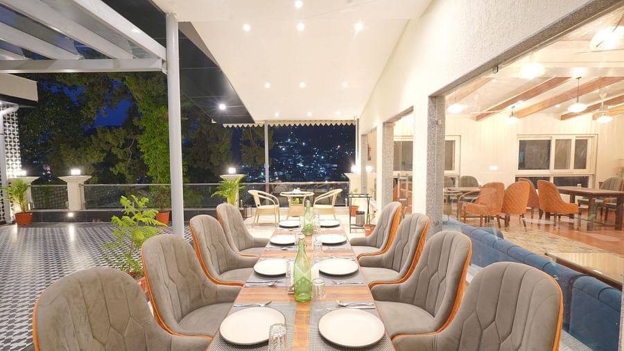 Dining area on the rooftop at DLS Oak Bush, Mussoorie.