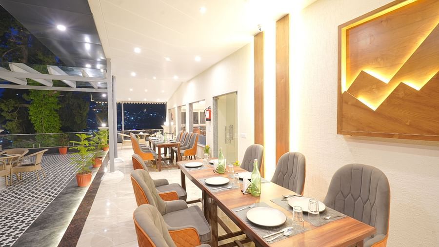 Dining area on the rooftop at DLS Oak Bush, Mussoorie.