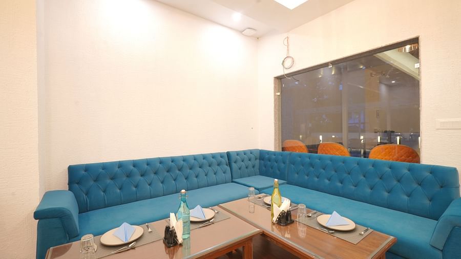 Dining seating of restaurant at DLS Oak Bush, Mussoorie.