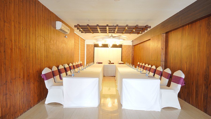 The image of the conference hall at DLS Whispering Winds with u-shaped seating arrangement