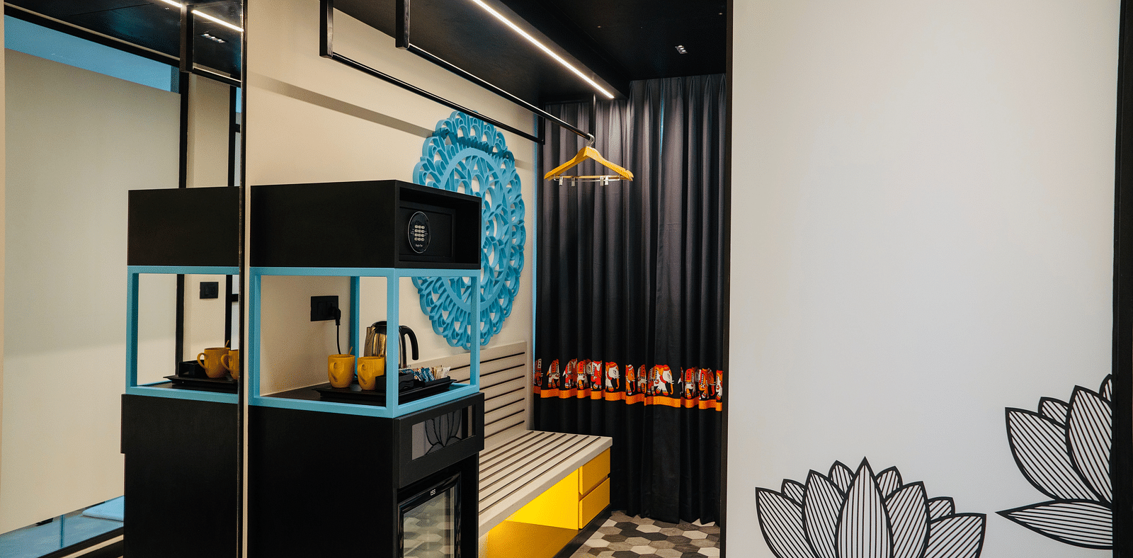 An image of a tea and coffee maker at Zibe Luxe Kakinada by GRT Hotels