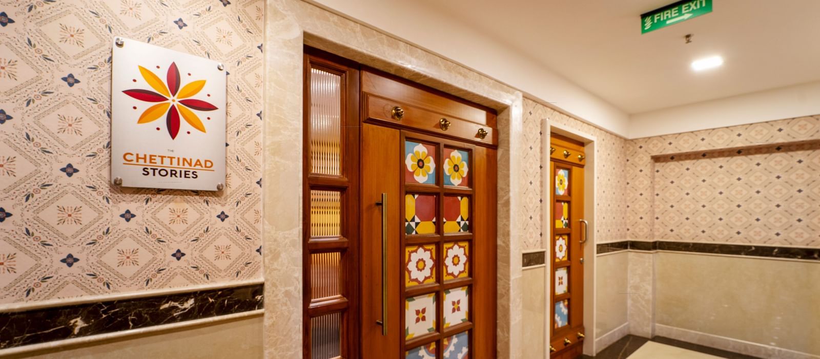 outside image of the entrance of the chettinad stories with the logo 