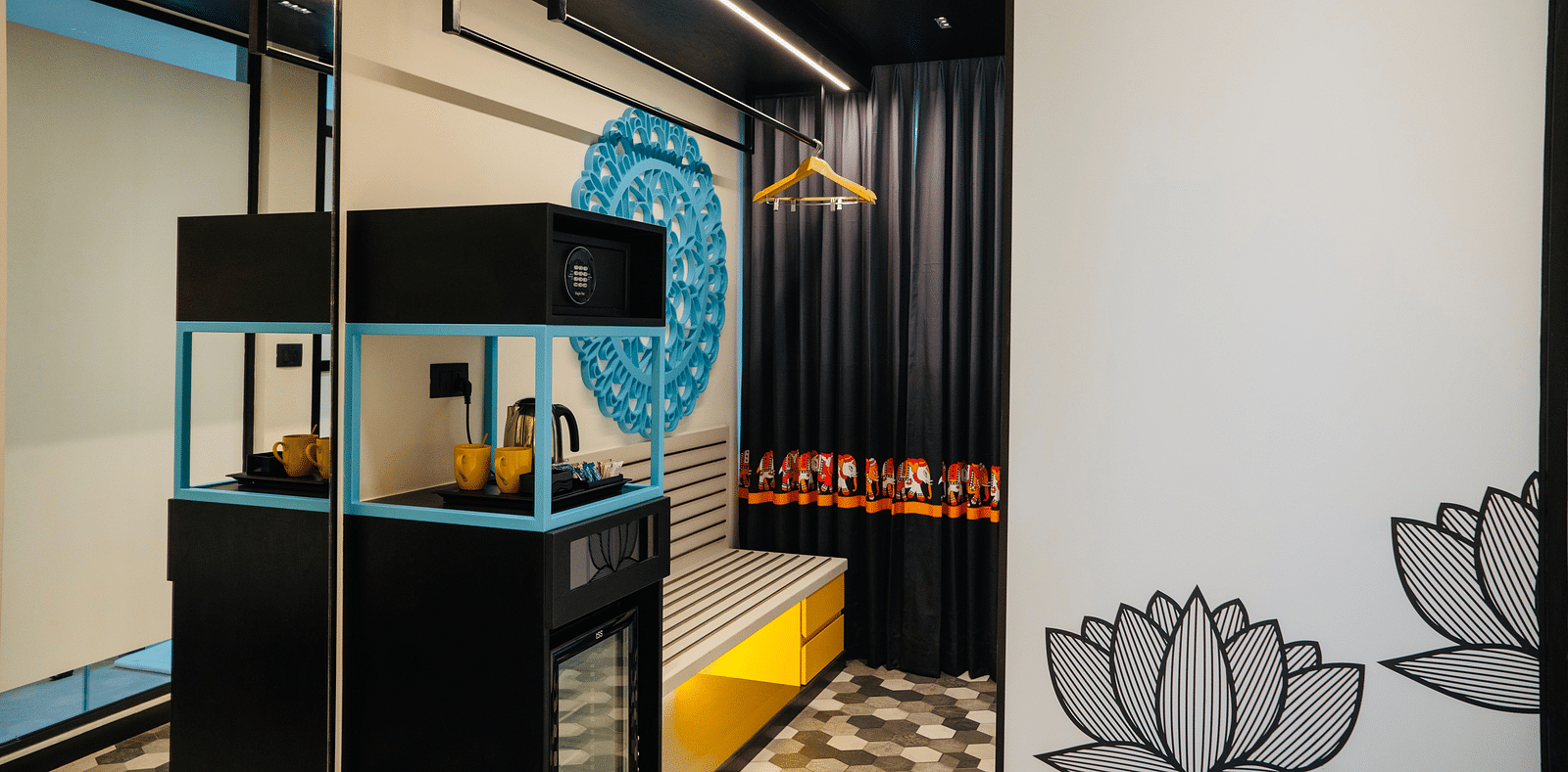 An image of a tea and coffee maker at Zibe Luxe Kakinada by GRT Hotels
