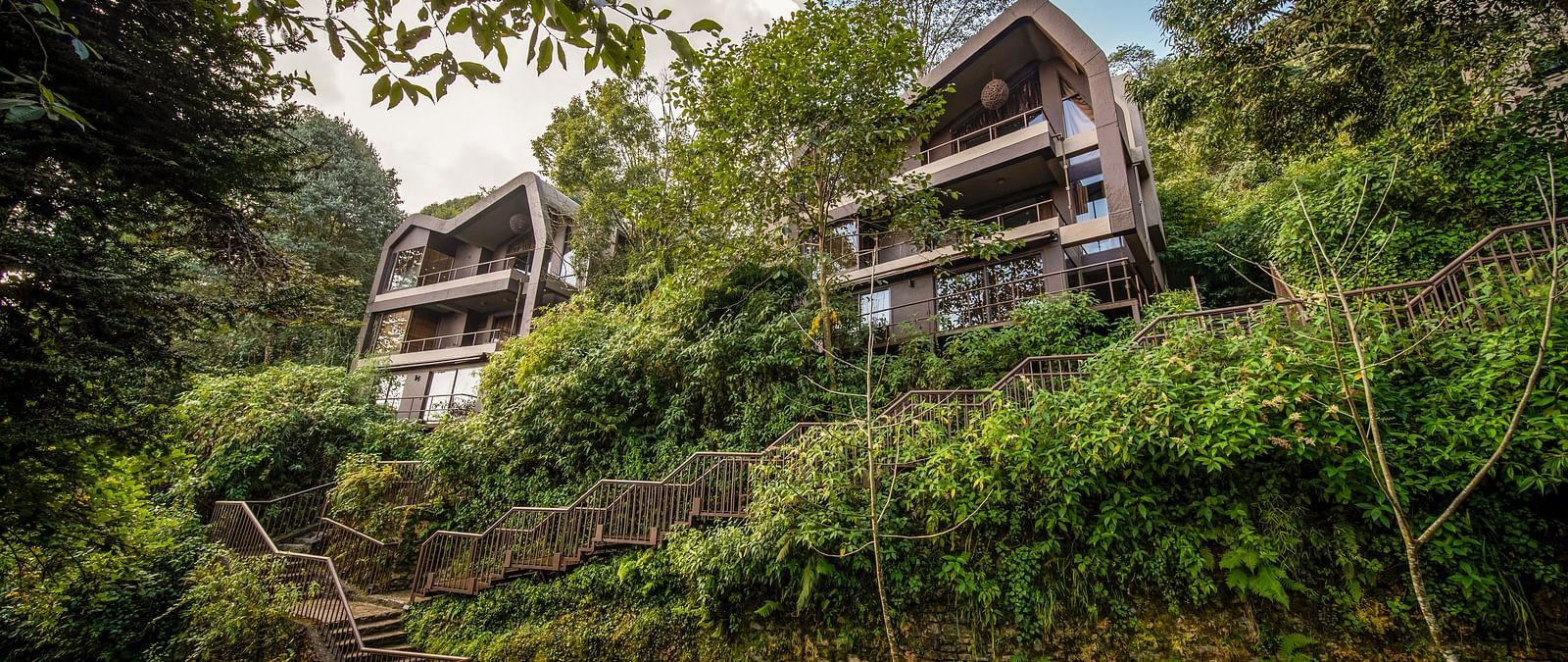 A villa covered with trees and shrubs | Kavya Resort and Spa, Nagarkot