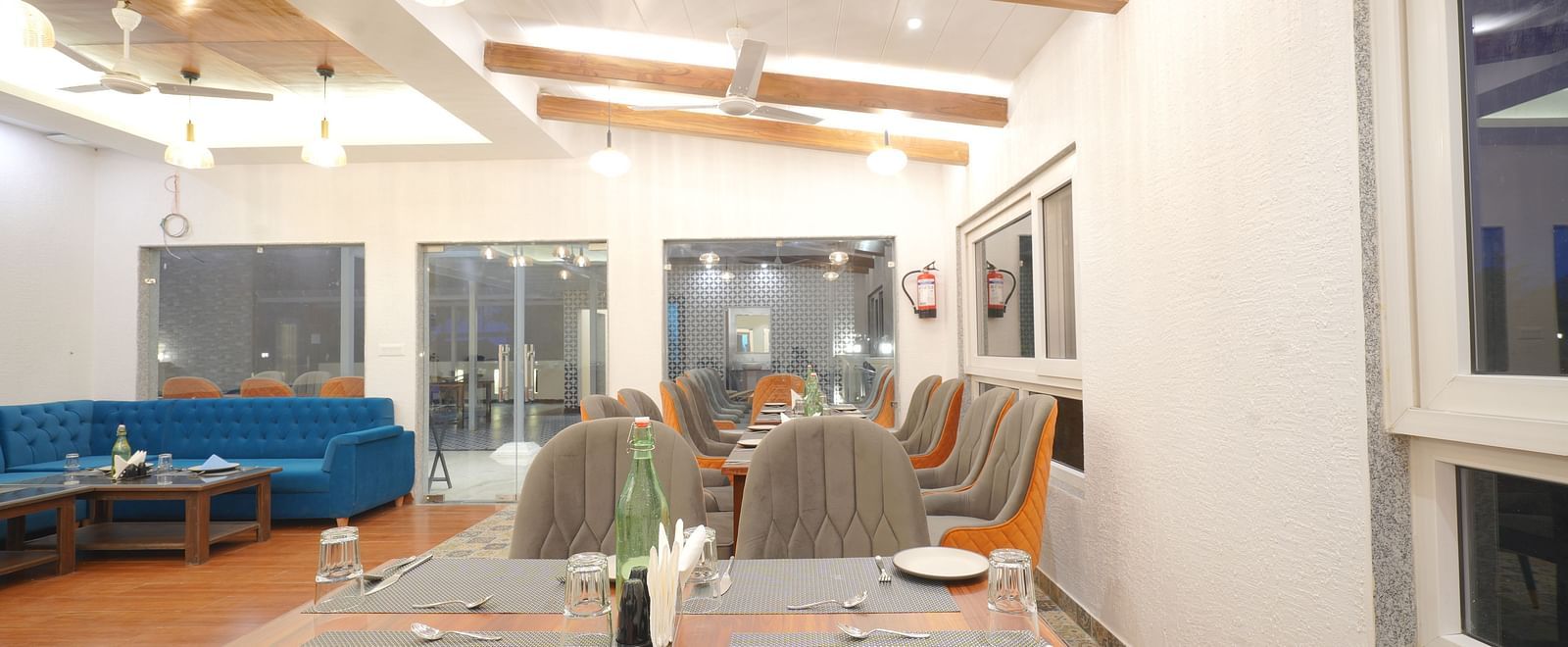 Dining seating of restaurant at DLS Oak Bush, Mussoorie.