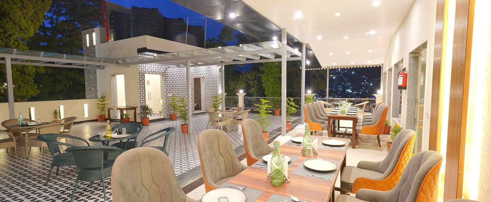 Dining area on the rooftop at DLS Oak Bush, Mussoorie.