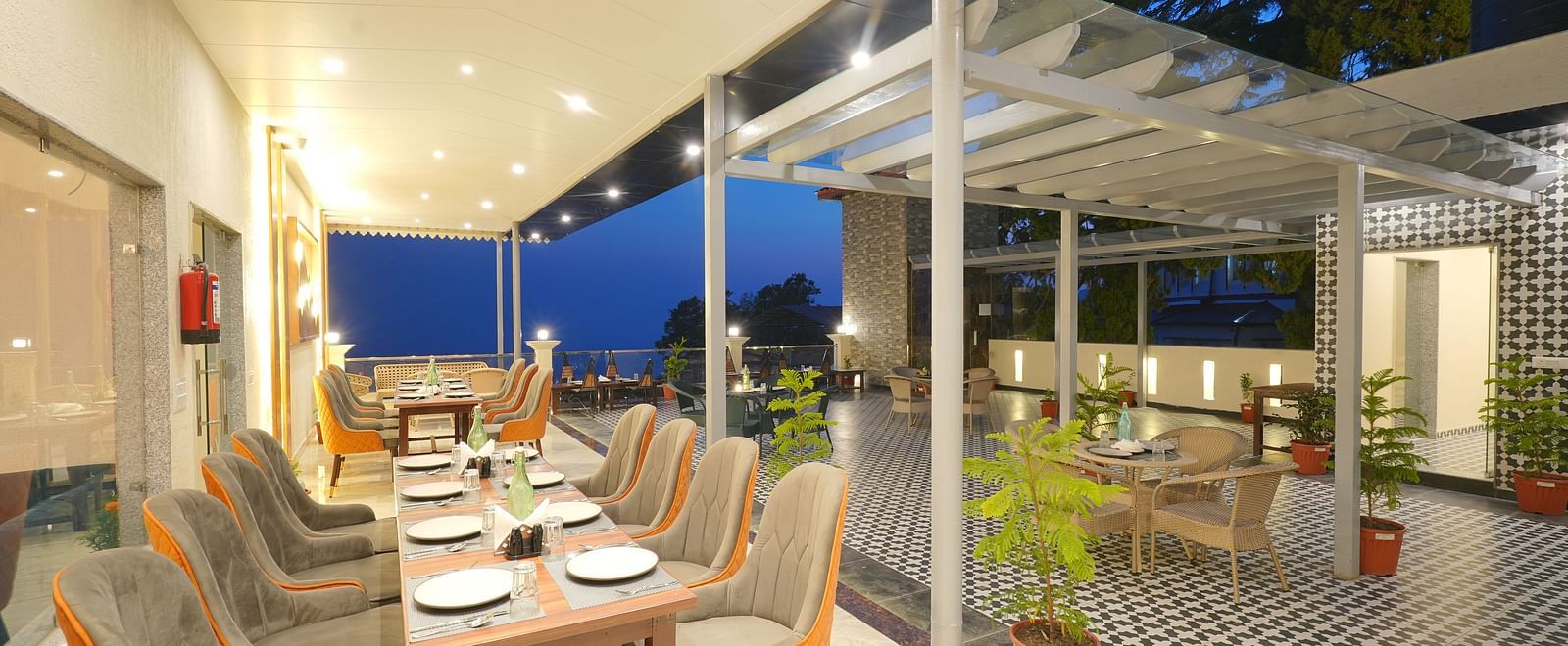 Dining area on the rooftop at DLS Oak Bush, Mussoorie.