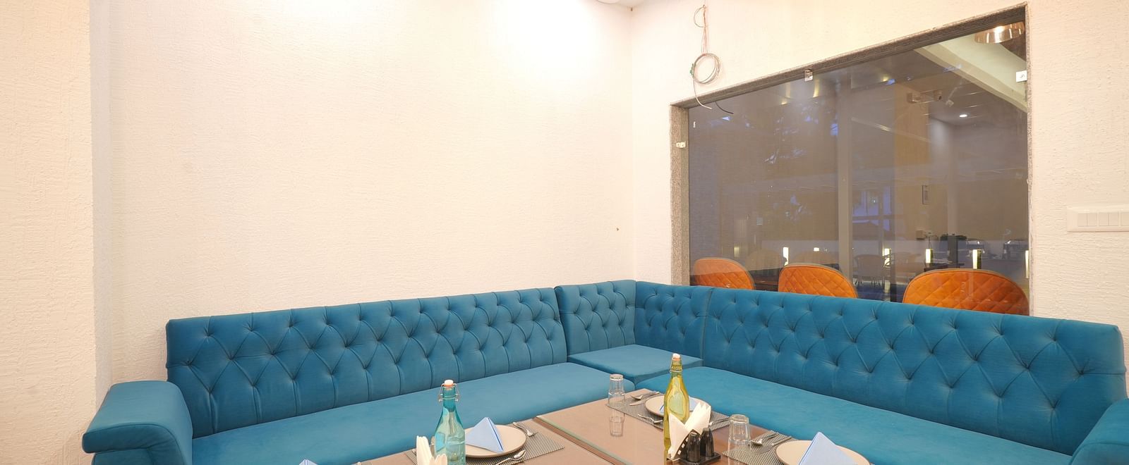Dining seating of restaurant at DLS Oak Bush, Mussoorie.