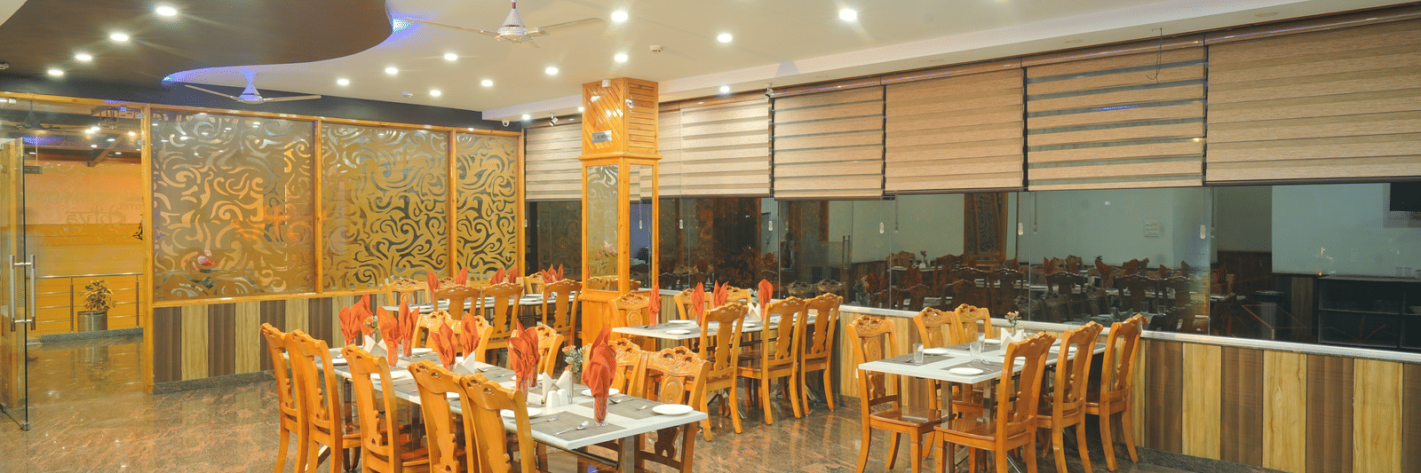 Image of the restaurant eaturing the seating arrangement | DLS Hotel Shiva Sanctuary and Spa