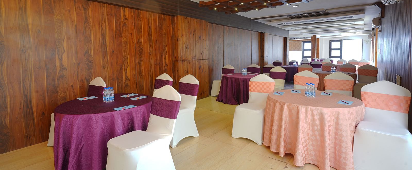 An image of the Whispering Wind Hall at DLS Whispering Winds with the cluster setting seating arrangement