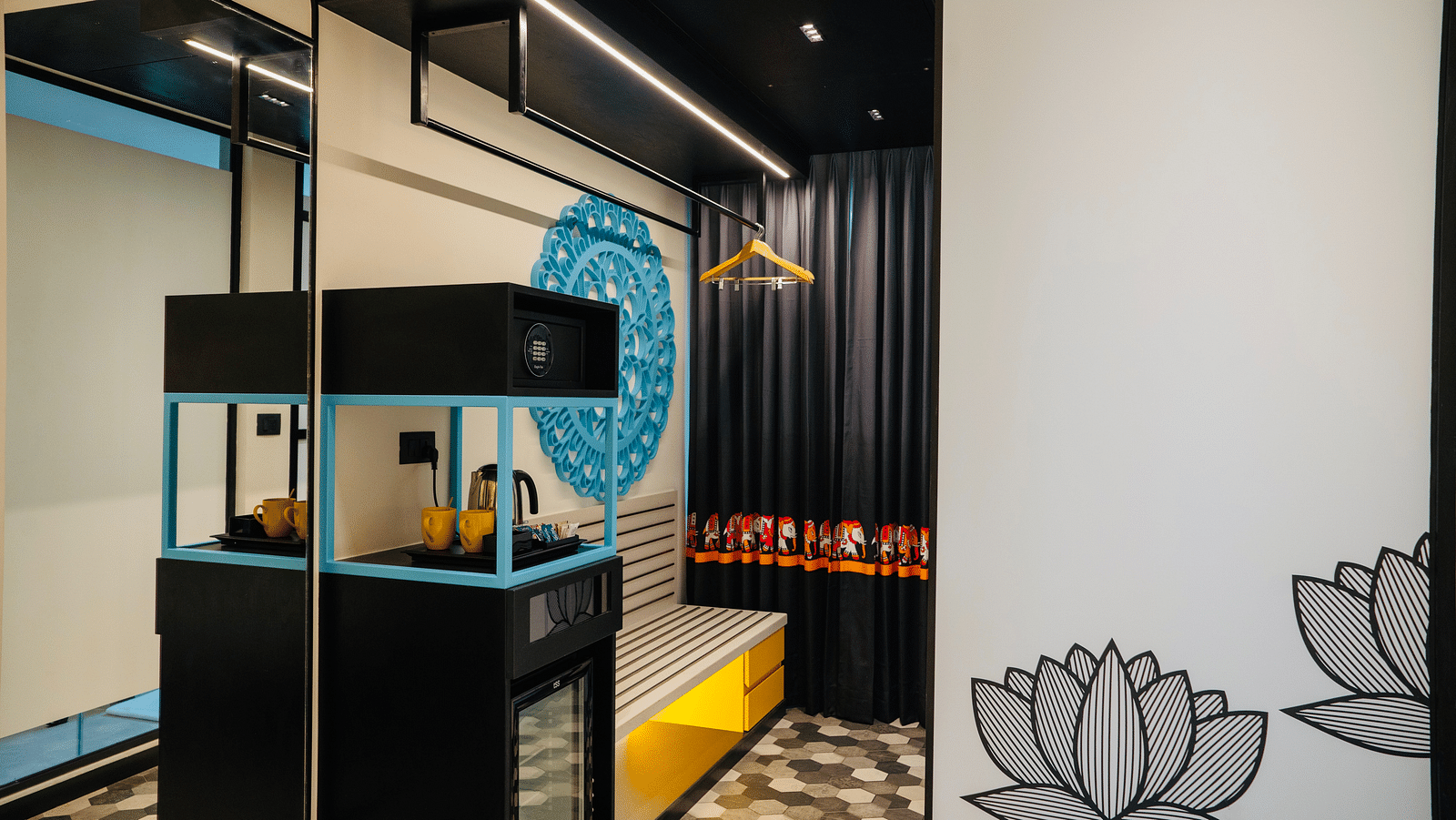 An image of a tea and coffee maker at Zibe Luxe Kakinada by GRT Hotels