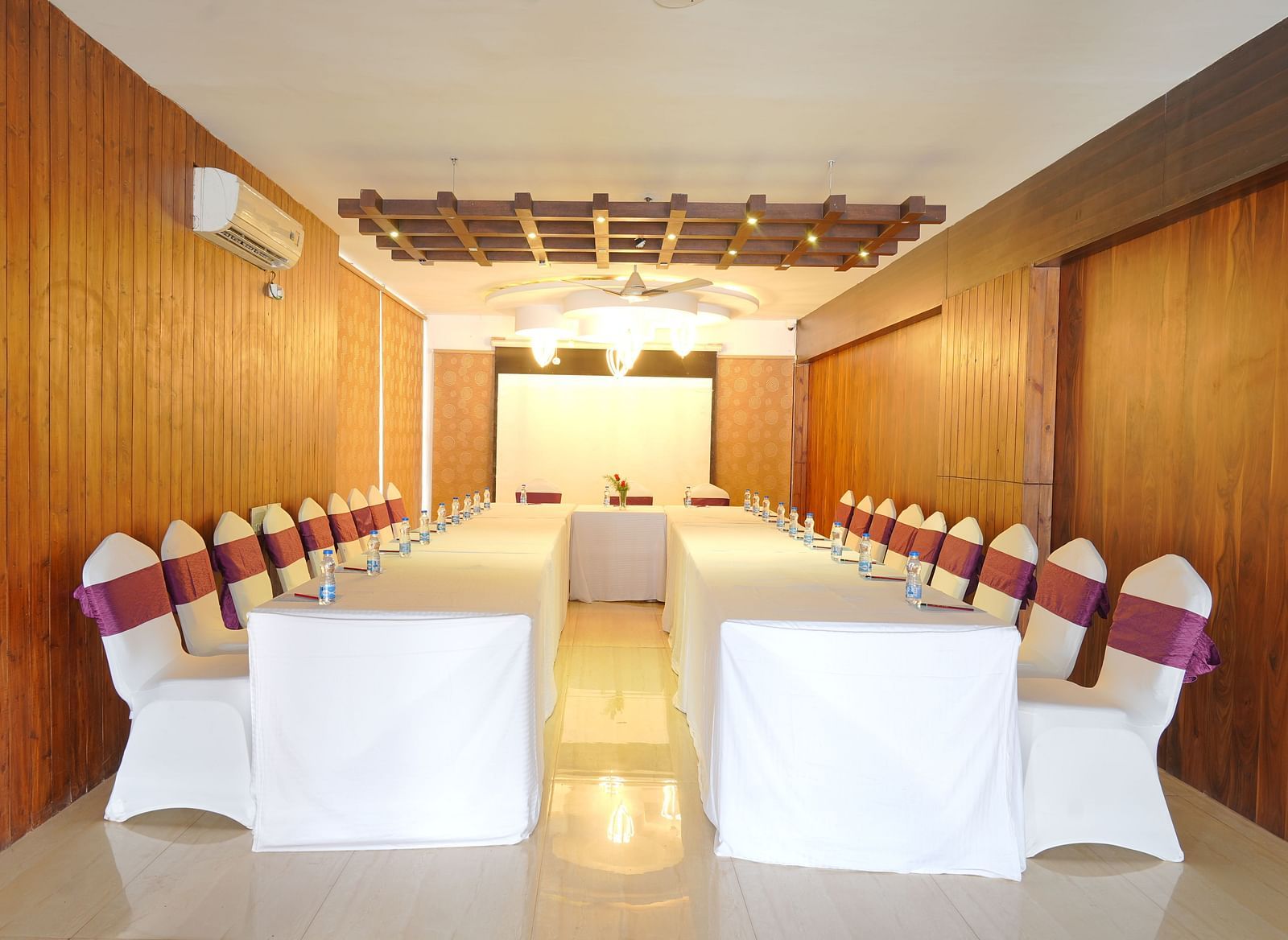 The image of the conference hall at DLS Whispering Winds with u-shaped seating arrangement