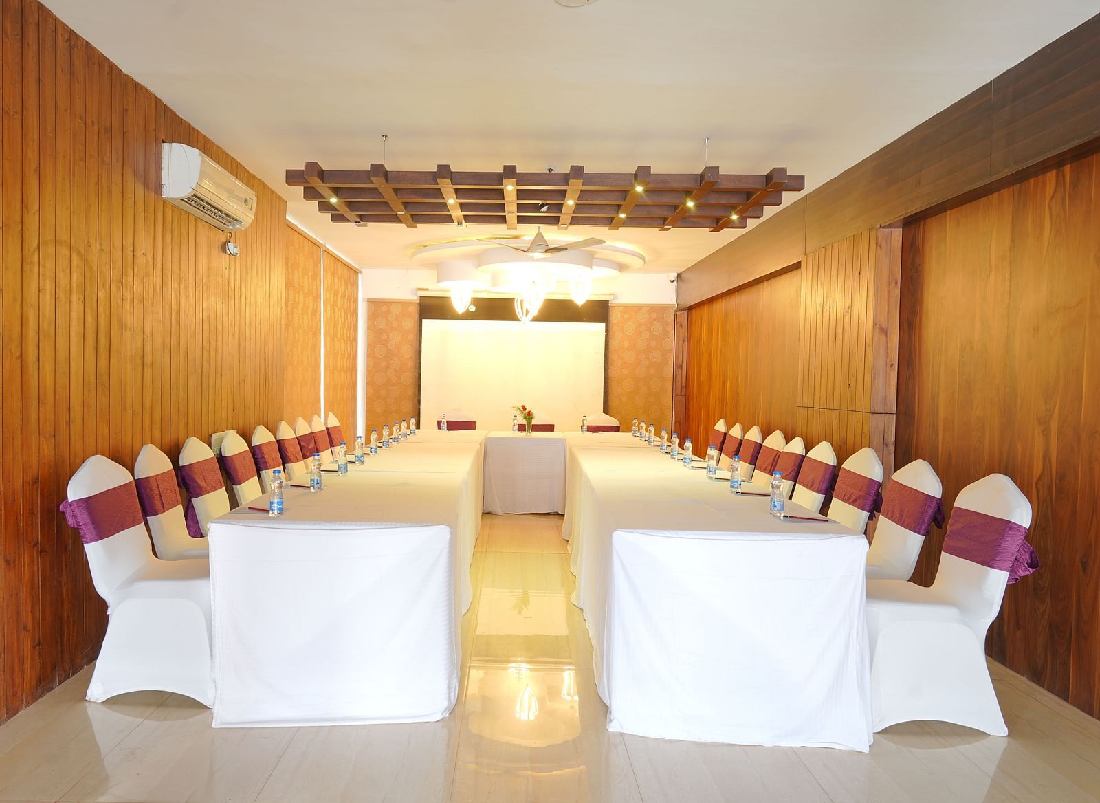 The image of the conference hall at DLS Whispering Winds with u-shaped seating arrangement