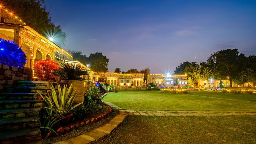 Deo Bagh - 17th Century, Gwalior - the garden area with lights on at the Gwalior resort