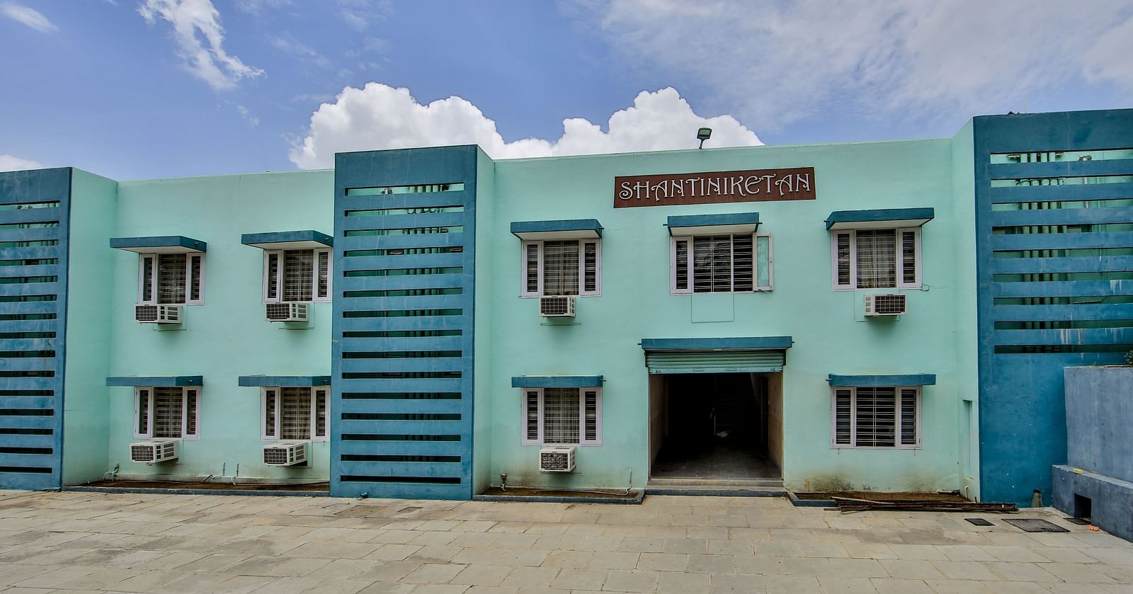 Vibrant Blue colour Facade of Hotel Shantiniketan in Hyderabad near Ramoji Film City.