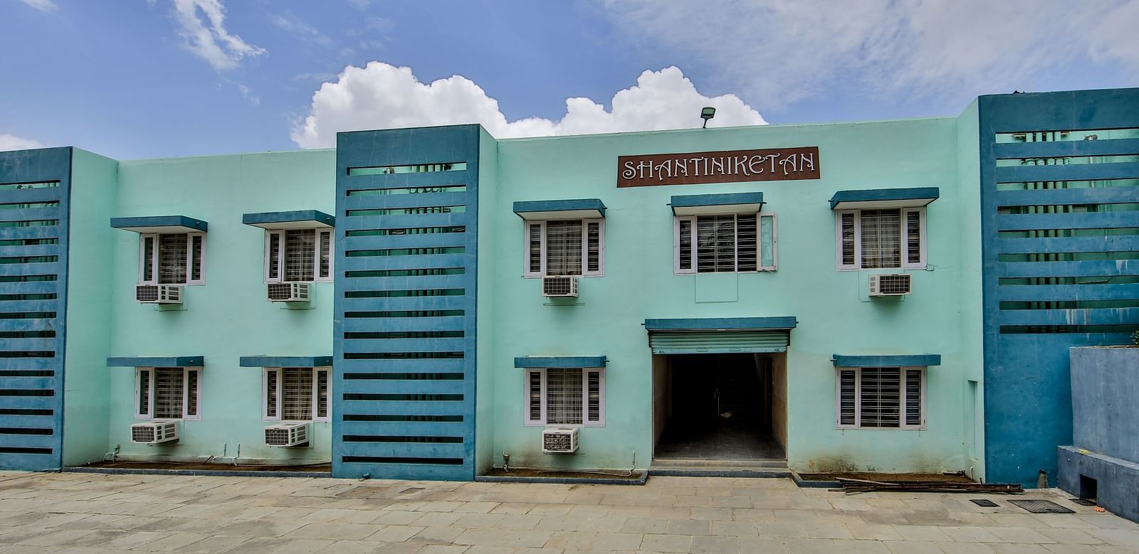 Vibrant Blue colour Facade of Hotel Shantiniketan in Hyderabad near Ramoji Film City.