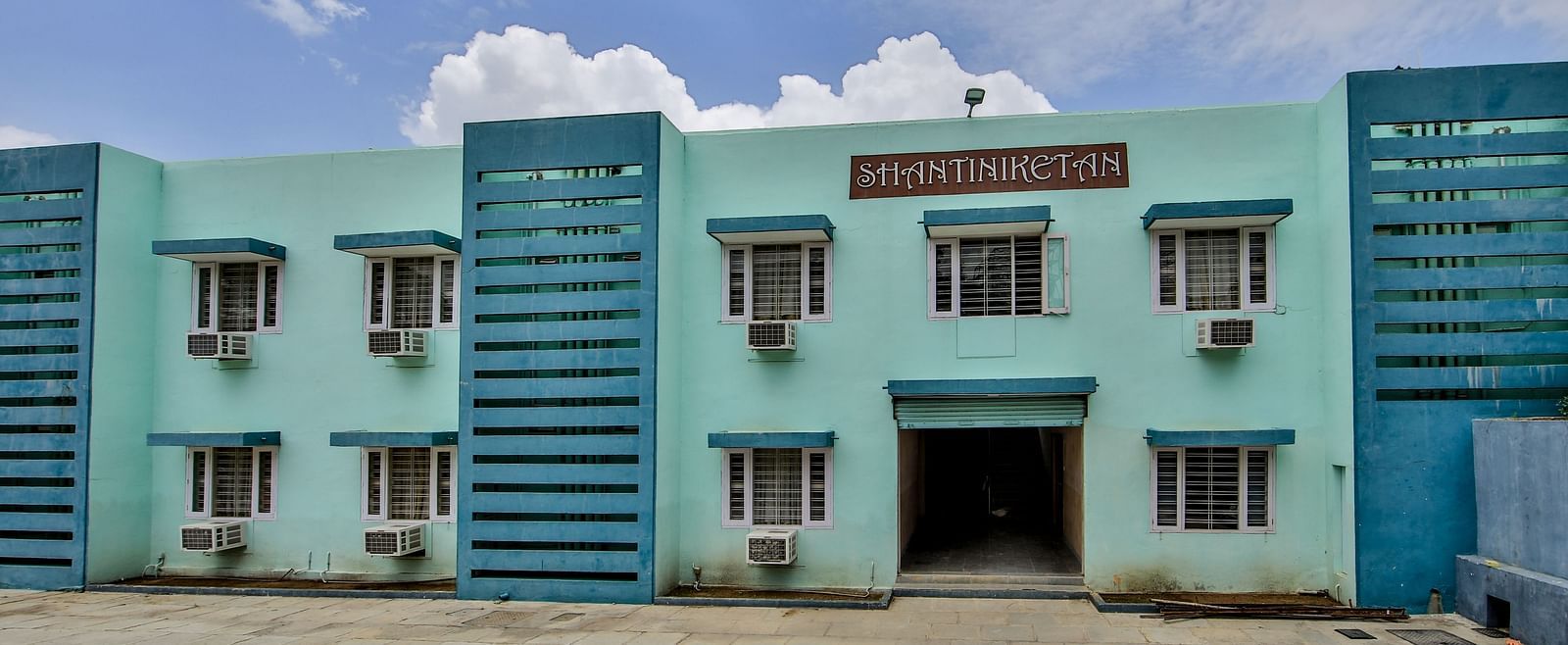 Vibrant Blue colour Facade of Hotel Shantiniketan in Hyderabad near Ramoji Film City.