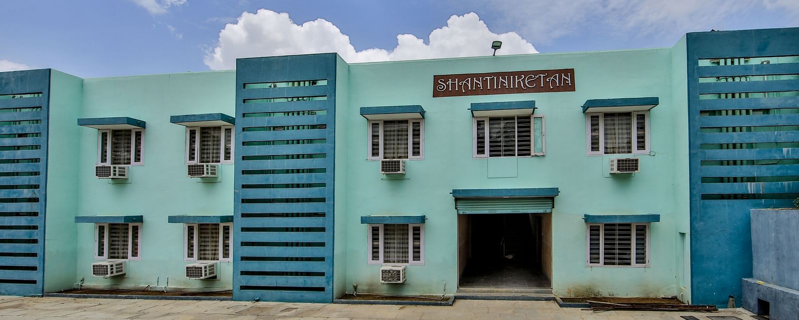 Vibrant Blue colour Facade of Hotel Shantiniketan in Hyderabad near Ramoji Film City.
