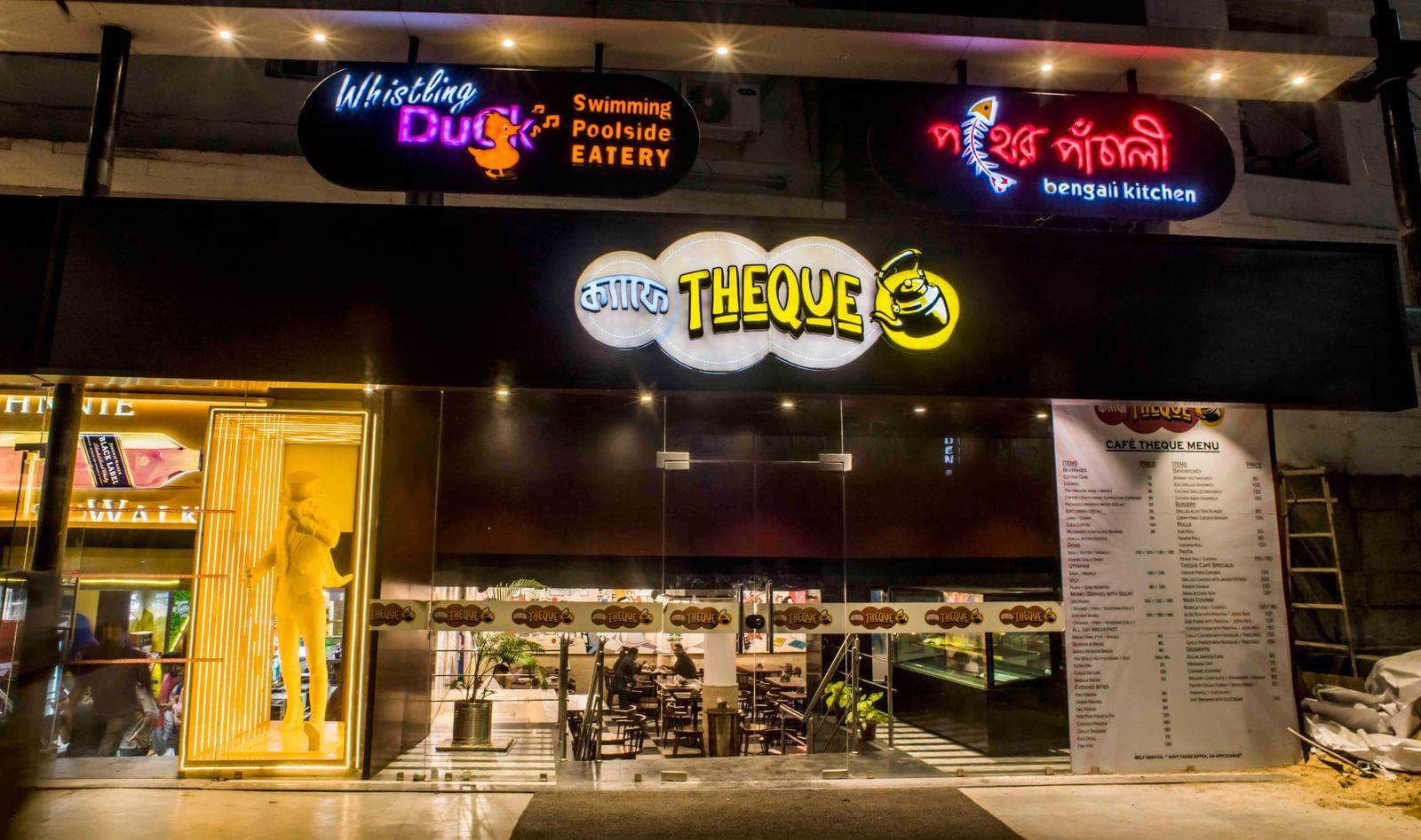 The exterior facade of a restaurant or dining venue at night, part of The Citi Residenci Hotel, Durgapur.