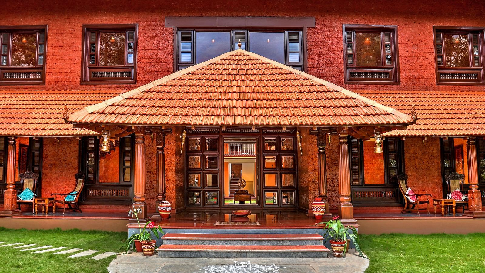 facade image of the malnad palace at hoysala village resort, hassan.