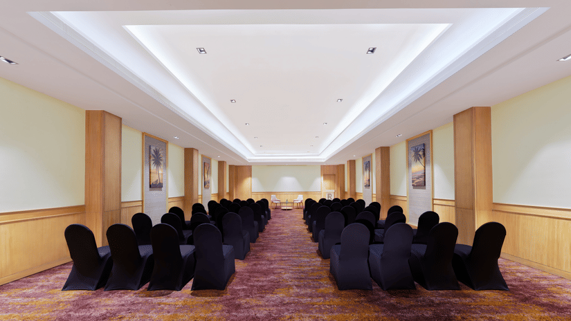 An overview of the Harbour Hall with chairs facing towards the stage | The Resort, Mumbai