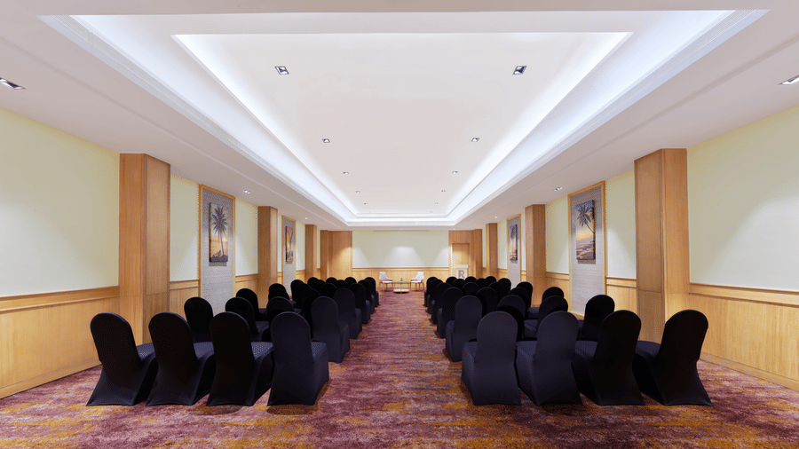 An overview of the Harbour Hall with chairs facing towards the stage | The Resort, Mumbai