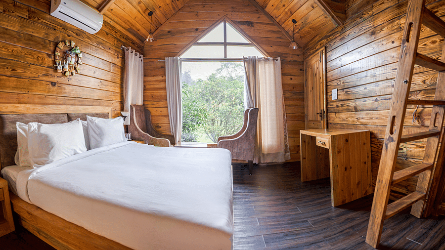 A view of the large bed at Pinewood Cottage at the Sylvan Retreat, Dehradun.